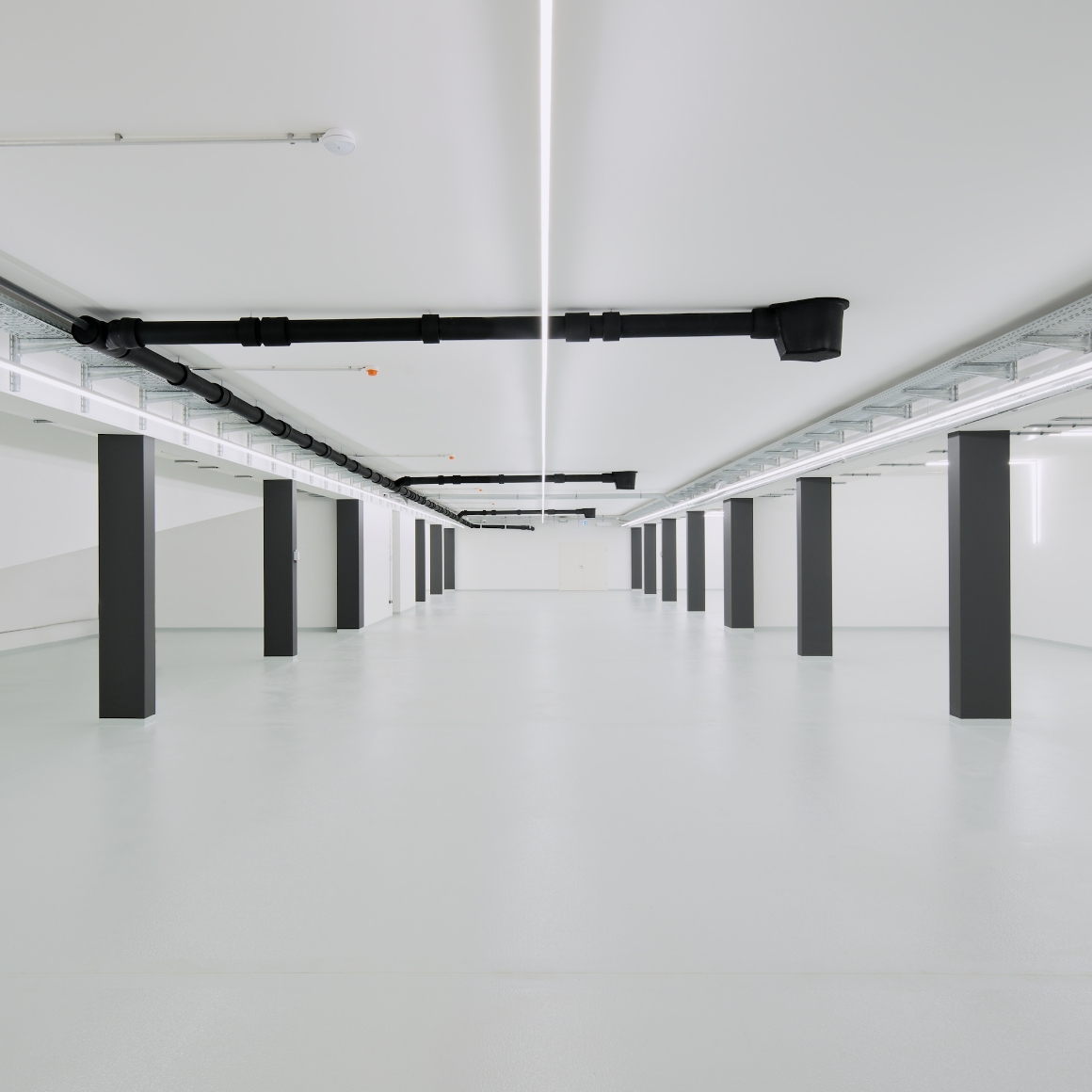 Tiefgaragenbeleuchtung Parkhaus Berlin LED Leuchten Luxsystem von Hadler