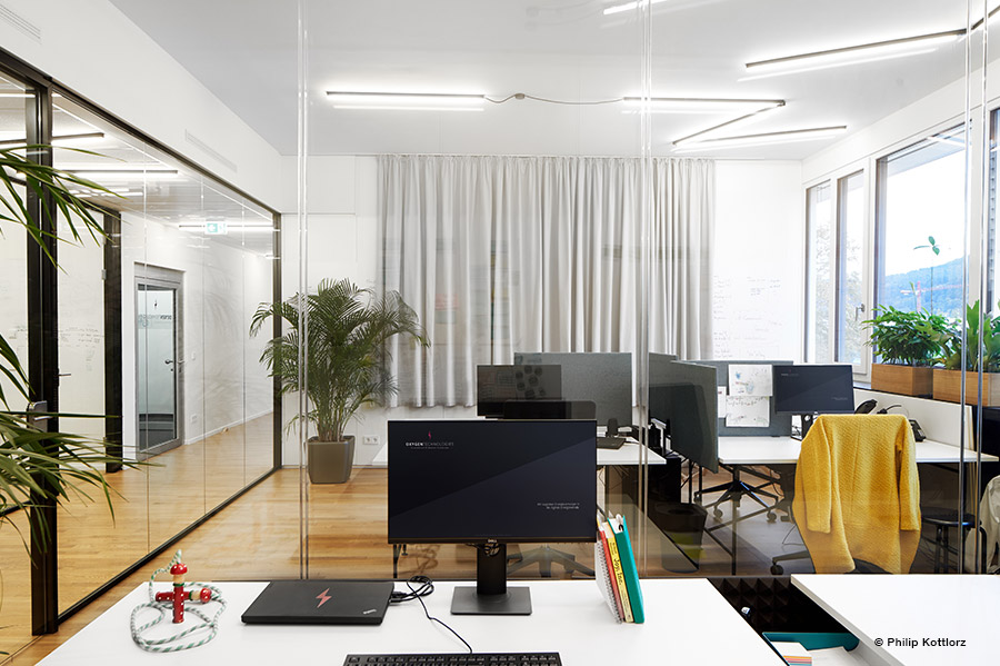 Ceiling lighting in large office with luxsystem on led luminaires